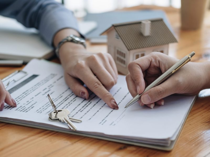 legal consultants, notary or justice lawyer discussing contract document on desk with client customer in courtroom office, business, justice law, insurance, legal service, buy and sell house concept.